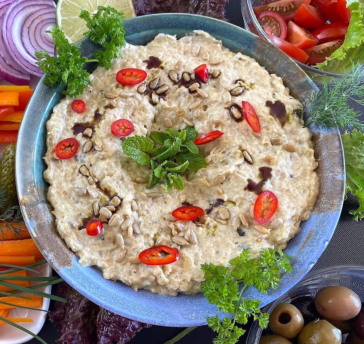 Dip in round bowl with vegetables
