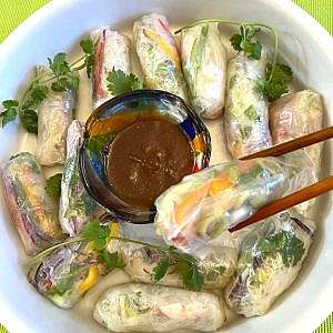 Chopsticks with spring rolls